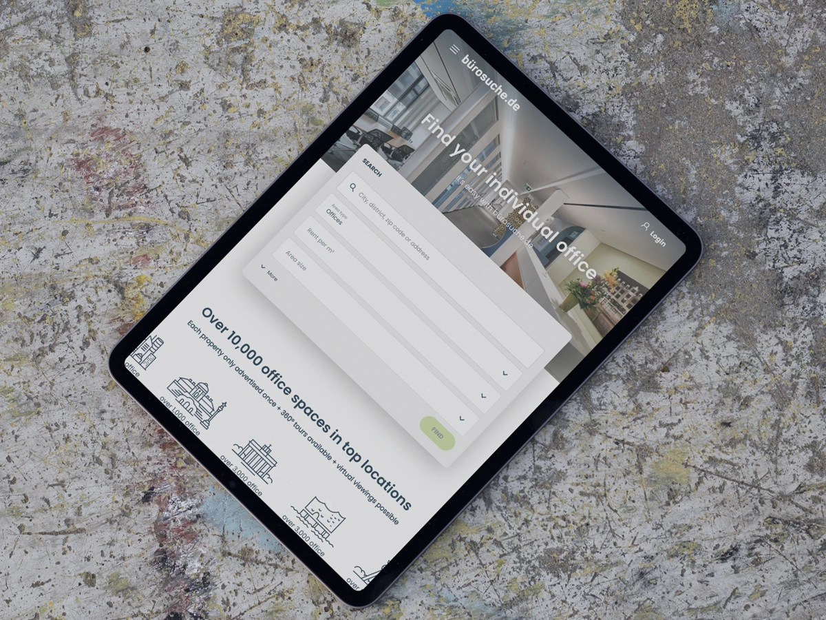 Foto: Tablet liegt auf Betonboden, Website Bürosuche.de ist geöffnet